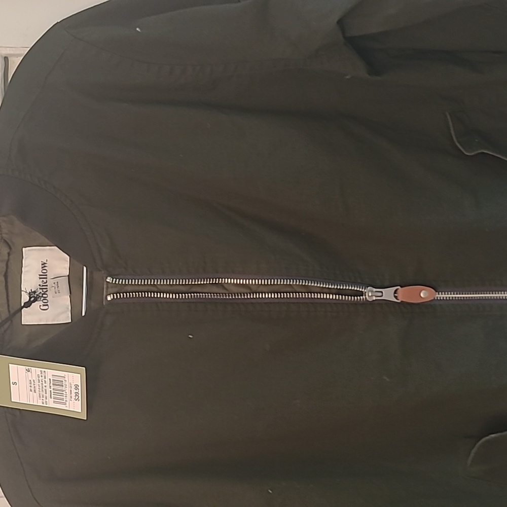 Jacket for men,woman or teen  ir is olive green and never been worn